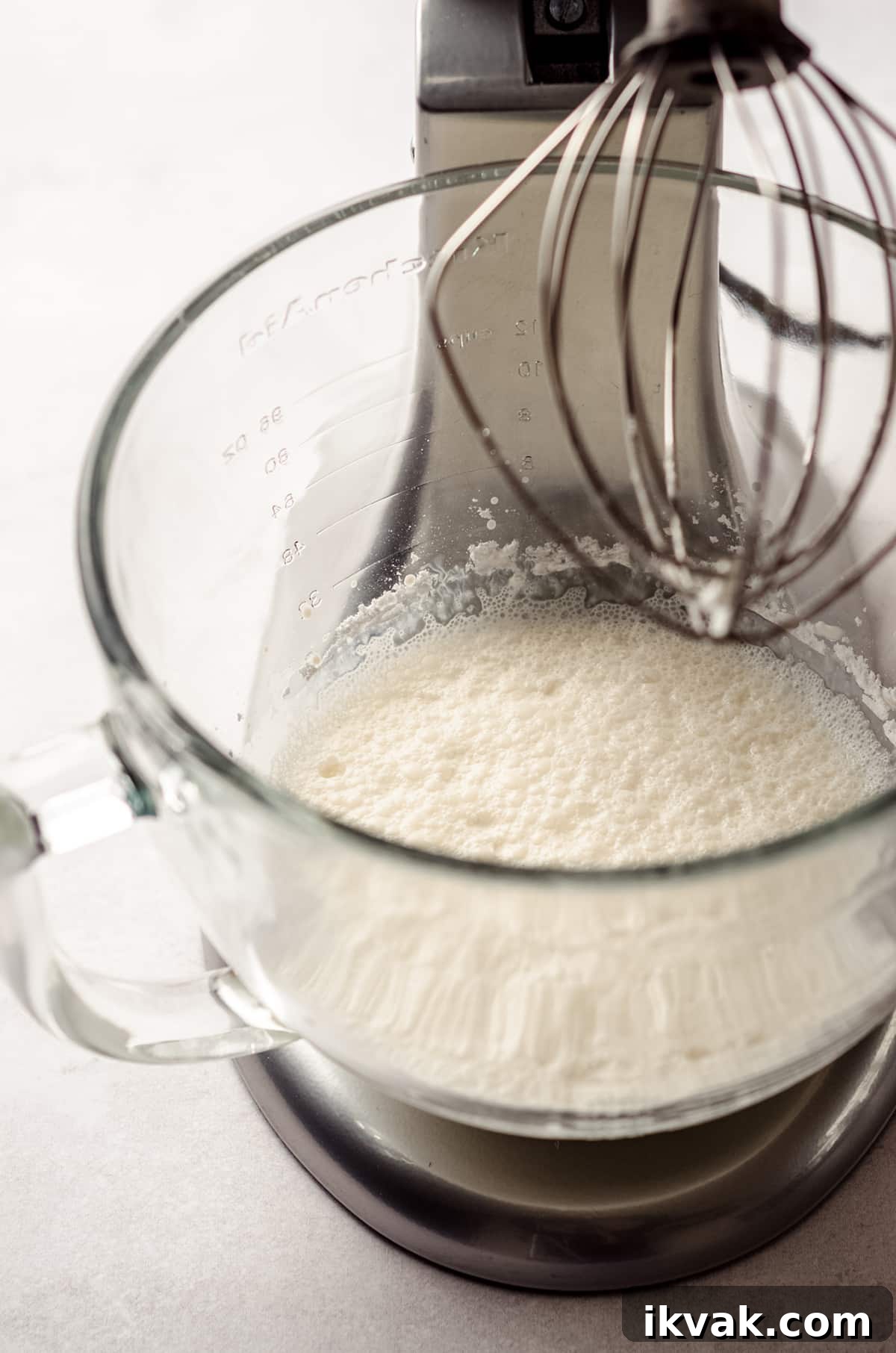 process shot for homemade whipped cream in a stand mixer