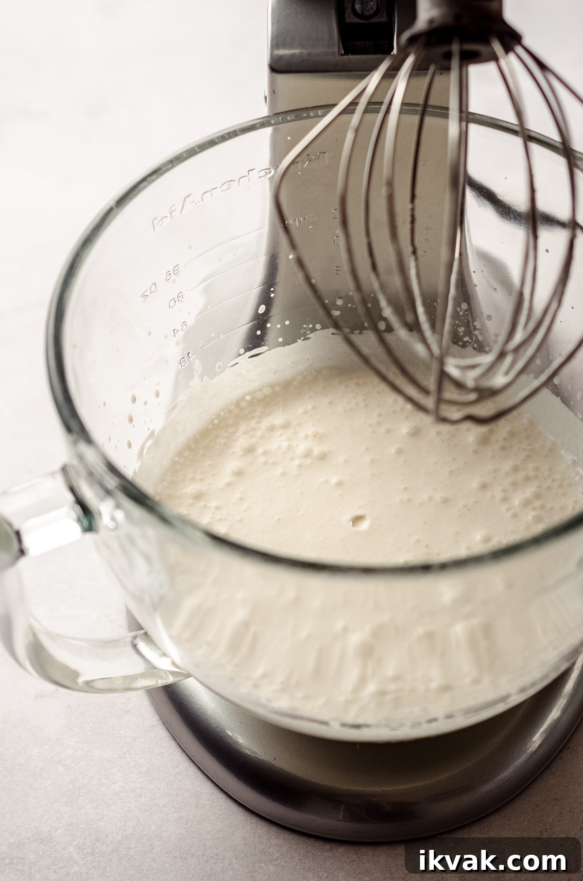 process shot for homemade whipped cream in a stand mixer