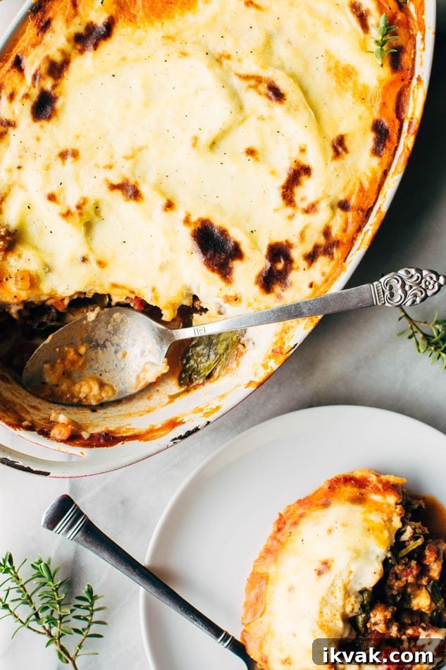 Paleo italian shepherds pie with bolognese sauce and whipped parsnips! A delicious and easy casserole packed full of veggies and delicious flavors - perfect for a healthy cold weather dinner!