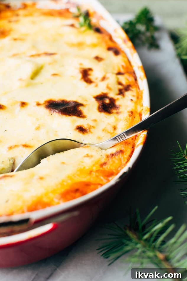Paleo italian shepherds pie with bolognese sauce and whipped parsnips! A delicious and easy casserole packed full of veggies and delicious flavors - perfect for a healthy cold weather dinner!
