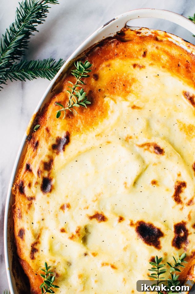 Paleo italian shepherds pie with bolognese sauce and whipped parsnips! A delicious and easy casserole packed full of veggies and delicious flavors - perfect for a healthy cold weather dinner!