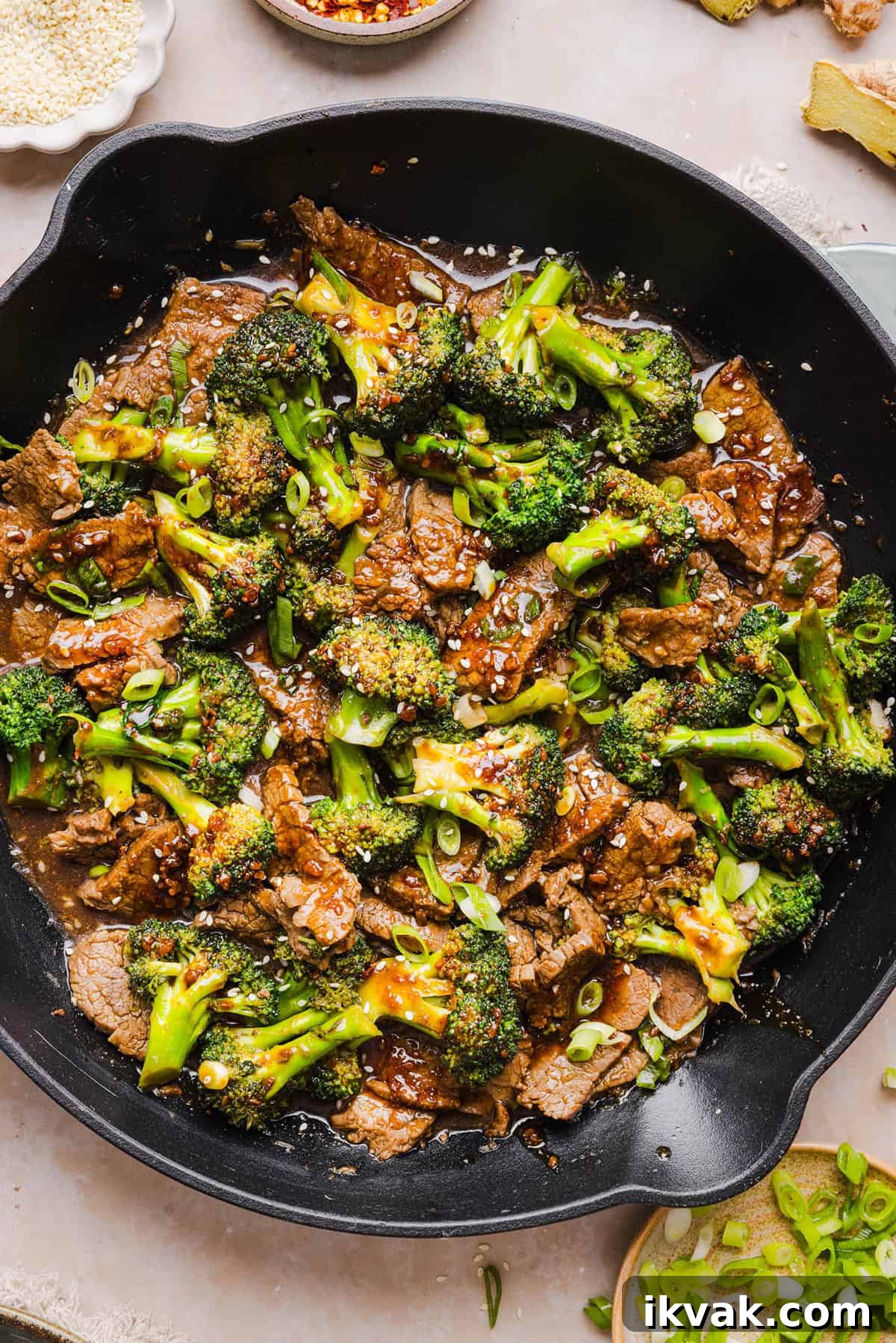 You'll love this Healthy Beef and Broccoli recipe made with tender flank steak, crisp broccoli and a savory garlic ginger sauce. A quick and easy weeknight dinner that tastes better than take-out and comes together in under 30 minutes!
