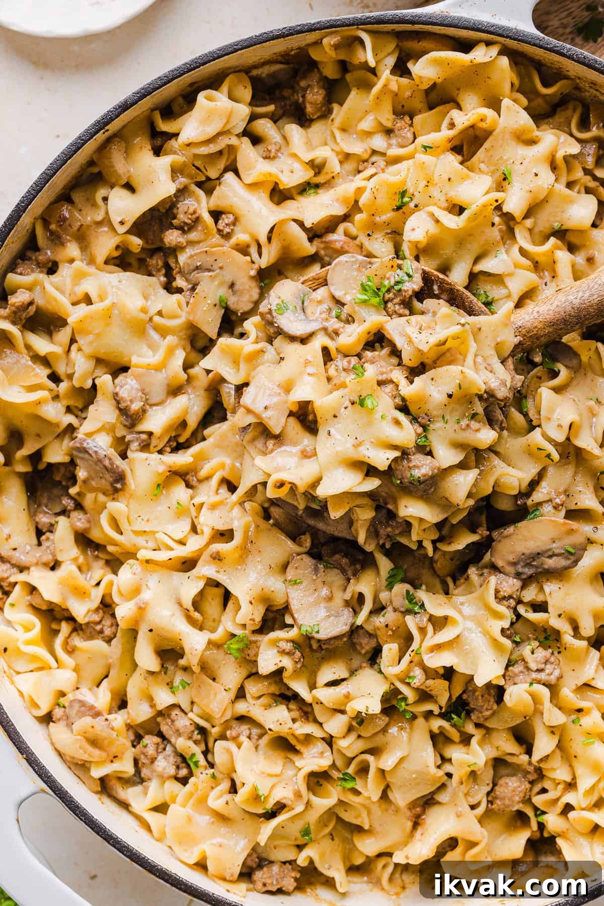 This Healthy Ground Beef Stroganoff Casserole is the ultimate family-friendly comfort food! The perfect cozy weeknight meal made with egg noodles and smothered in the most delicious creamy mushroom sauce in just 30 minutes!