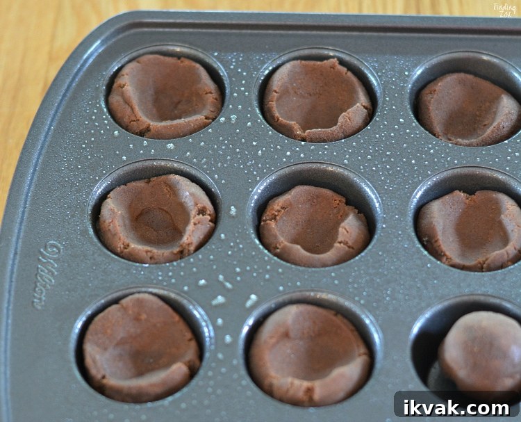 Chocolate cookie cups in a mini muffin pan