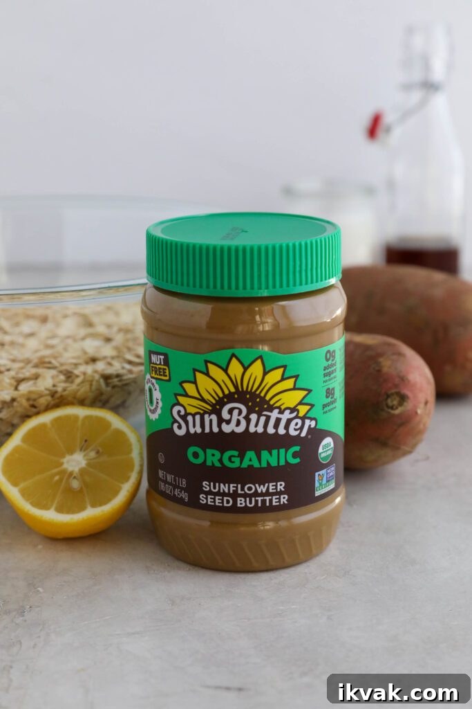 Organic SunButter on board with lemon, oats, sweet potato, almond milk, and maple syrup