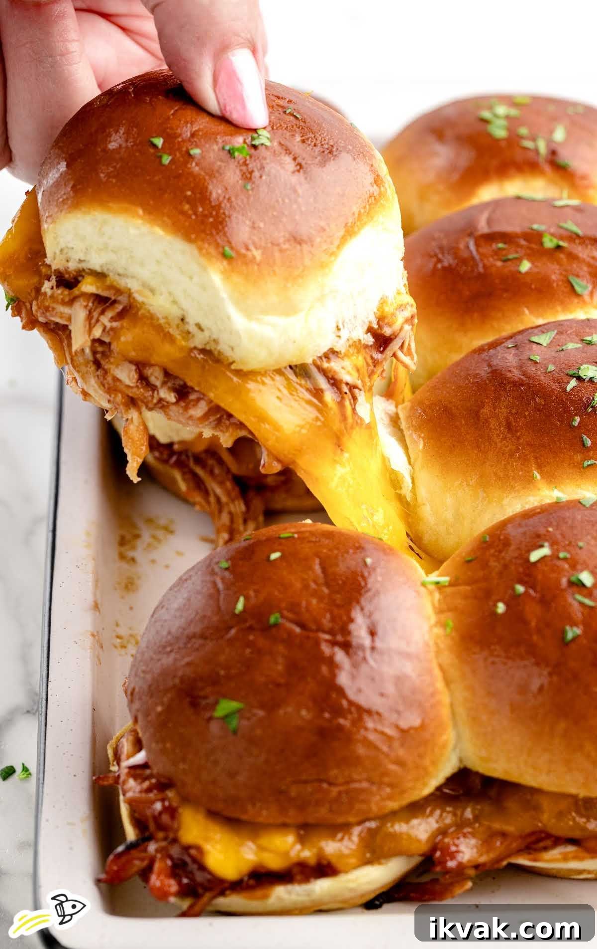 Tangy BBQ Chicken Sliders Recipe for Crowd-Pleasing Sandwiches 7 BBQ Chicken Sliders in a baking dish