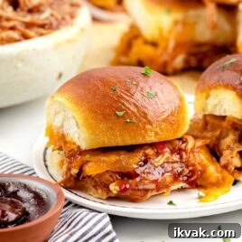 Tangy BBQ Chicken Sliders Recipe for Crowd-Pleasing Sandwiches 10 BBQ Chicken Sliders on a plate