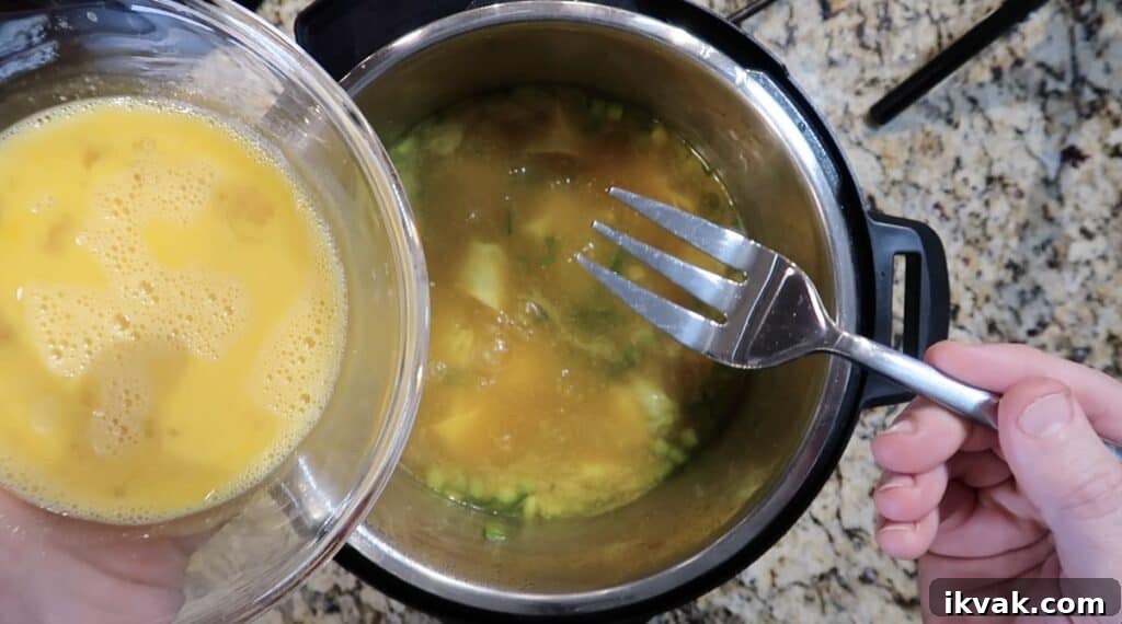 Adding or dropping the beaten eggs to the soup
