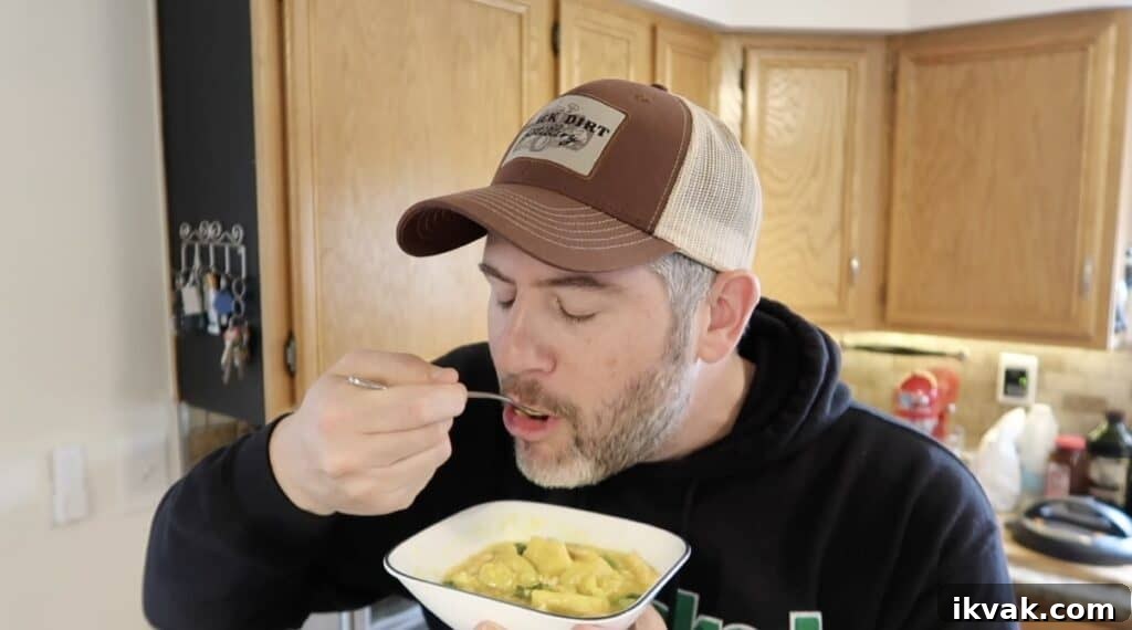 Man trying soup.