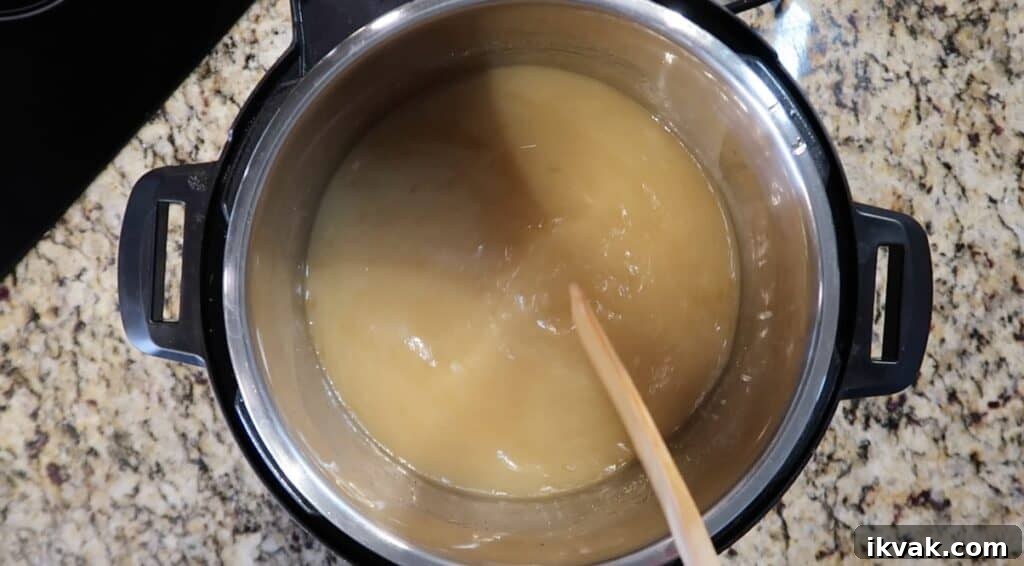Stirring broth before pressure cooking.