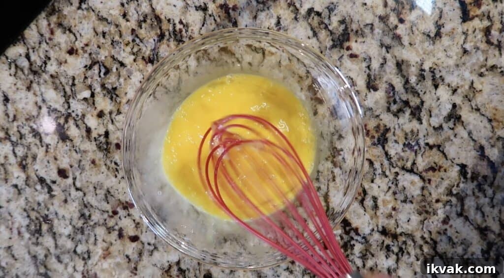 Whisking eggs in bowl