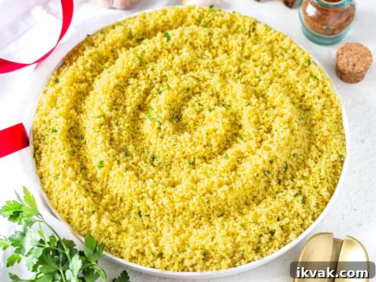 Couscous with chopped parsley on a plate