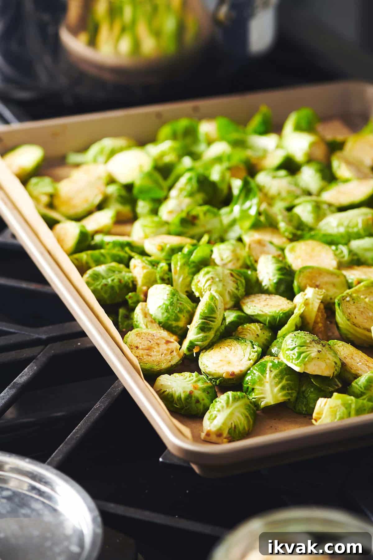 Crispy Roasted Brussels Sprouts: Simple Oven Recipe 6 Brussels Sprouts on a lined baking sheet.