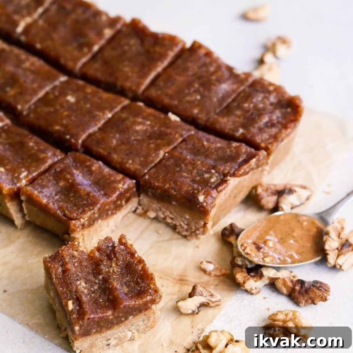 No bake Blondies on a parchment paper with walnuts.