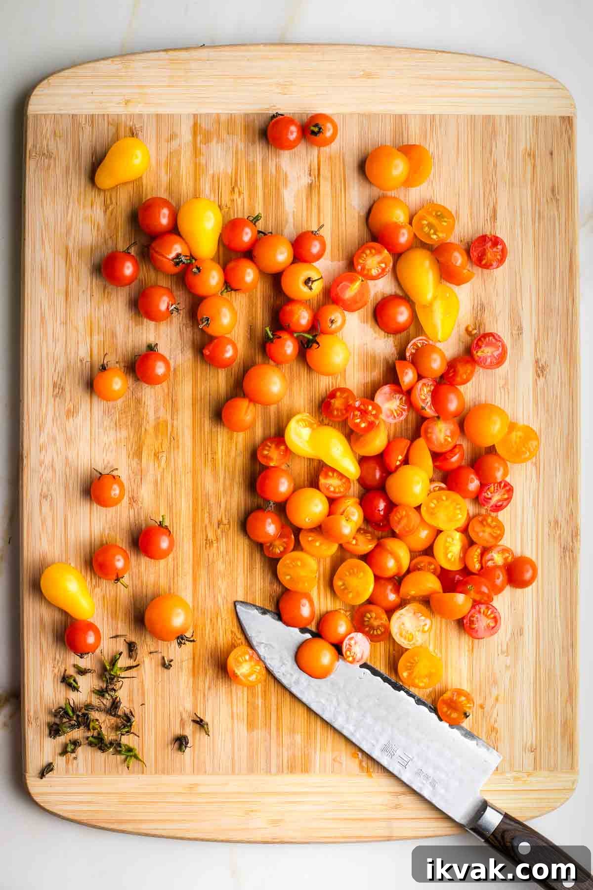 Gluten-Free Tabbouleh with Roasted Parsnips 6 Removing stems from cherry and grape tomatoes and then cutting them in half.