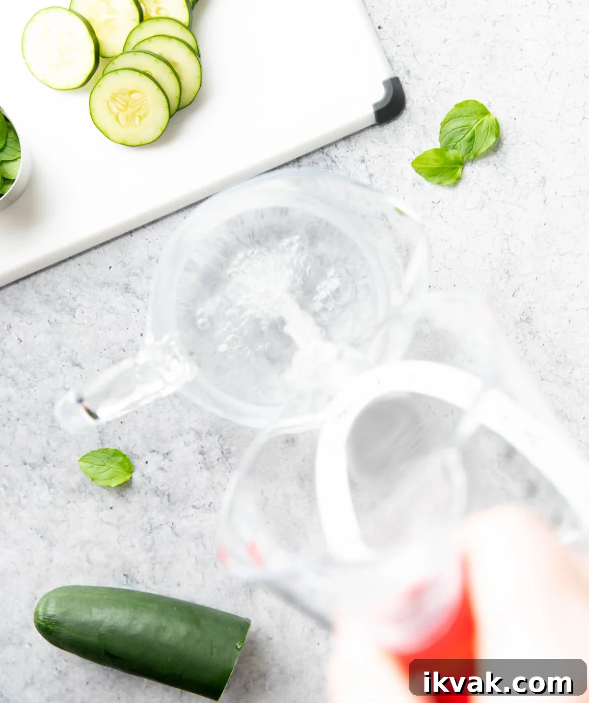 Two photos showing How to Make Cucumber Water – pouring filtered water into a pitcher