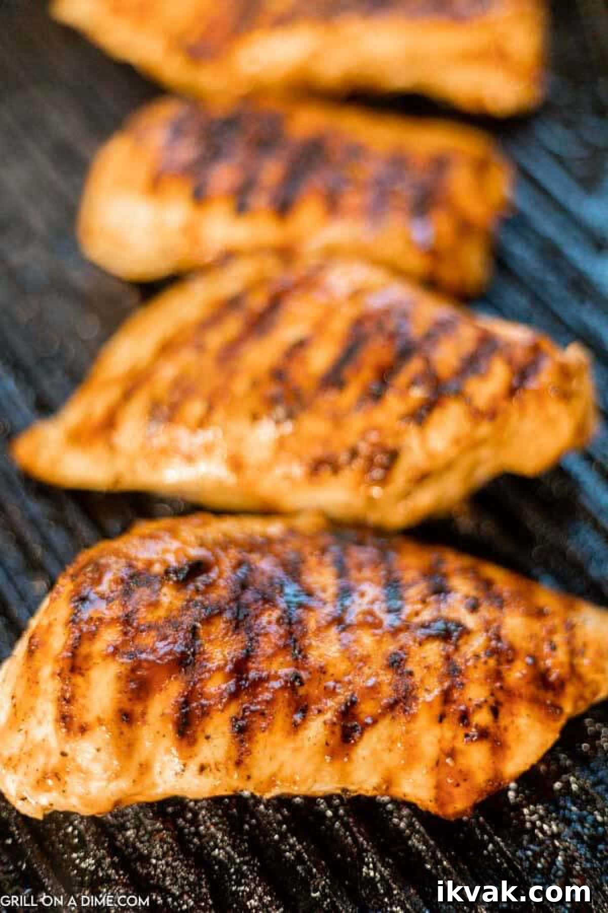 Grilled Chicken Breast on a grill.