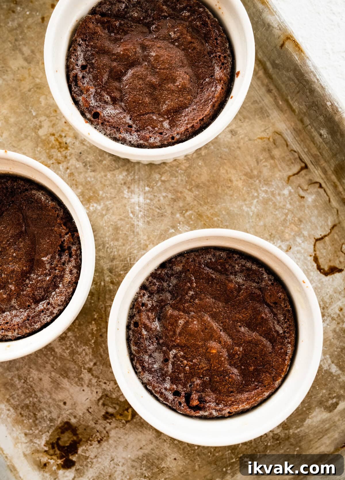 Baked lava cakes in ramekins.