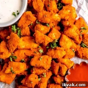 Crispy Air Fryer Buffalo Chicken Bites with Blue Cheese Dip 10 buffalo chicken and dipping sauce on white table