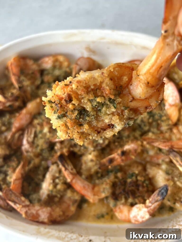 Shrimp Oreganata with White Wine Lemon Butter 8 Close up of one piece of shrimp oreganata.