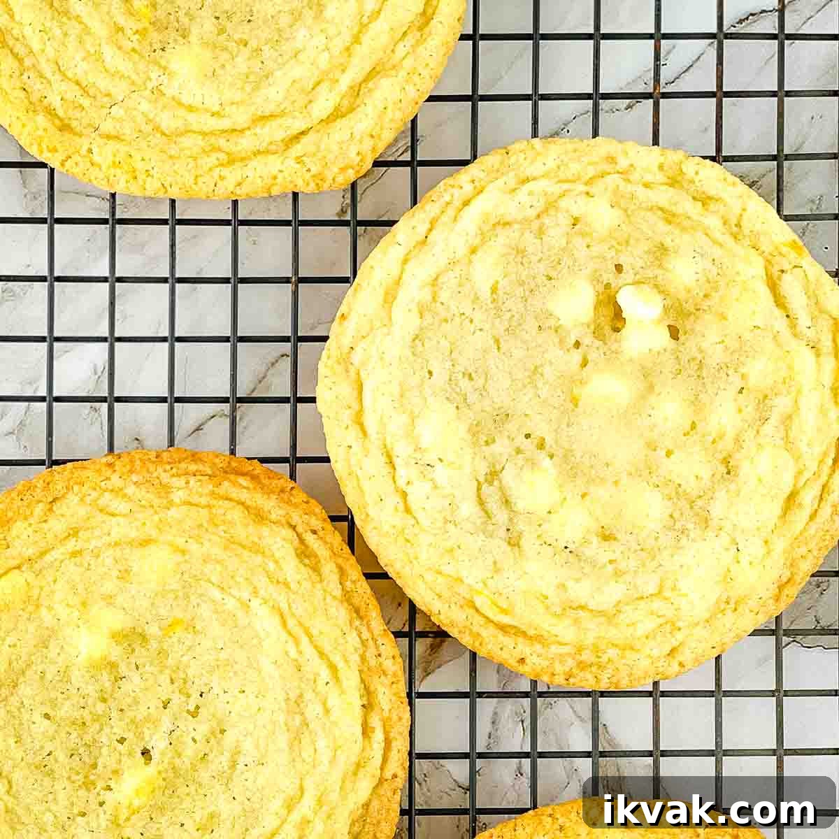 Lemon Drop Cookies Recipe: Soft, Chewy Cookies Like Panera 13 The baked cookies cooling on a cooling rack.