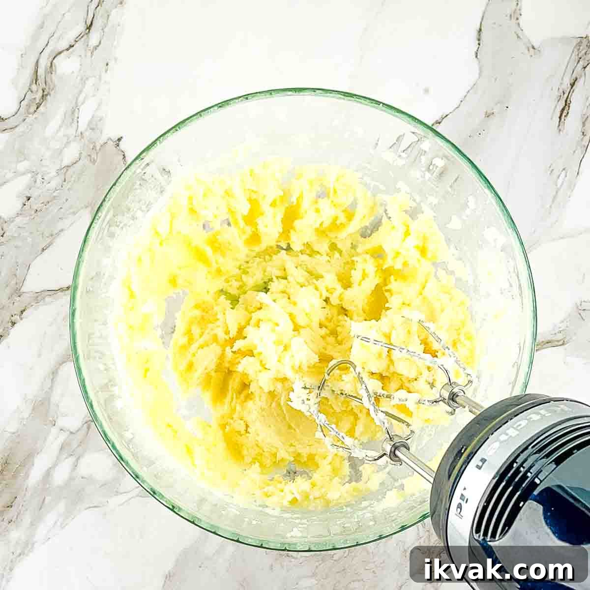 Lemon Drop Cookies Recipe: Soft, Chewy Cookies Like Panera 5 An electric mixer combining the butter and sugar in a bowl until creamy.