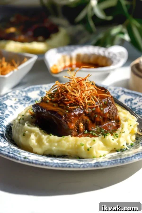 Miso maple short ribs with mashed potatoes and crispy leeks.