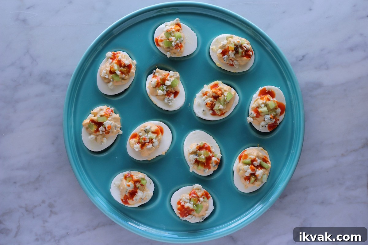 Buffalo Deviled Eggs - an easy 5-ingredient deviled egg, featuring celery, hot sauce, and blue cheese! Perfect for an appetizer or snack! | fedandfulfilled.com