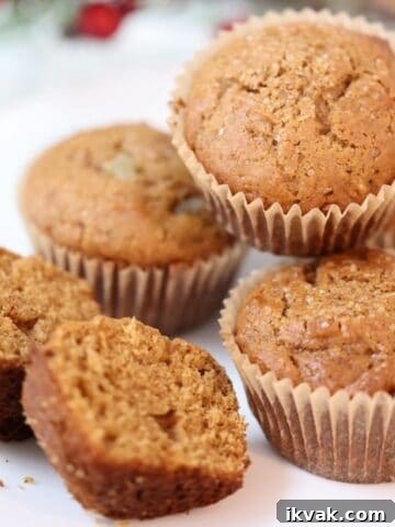 Gingerbread muffins on a white plate.