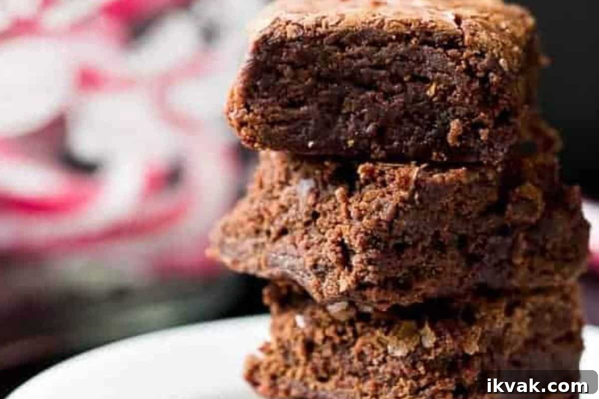 Let the brownies cool in the pan to firm up, then sprinkle extra crushed candy canes on top.