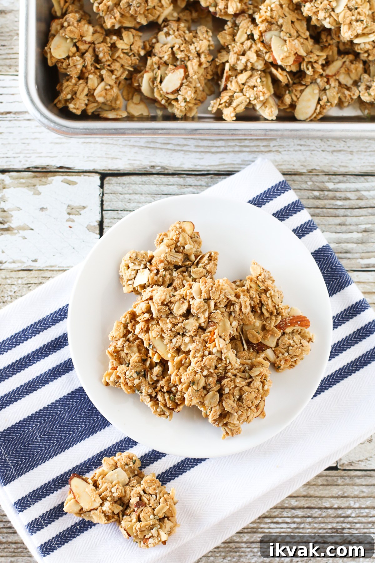 Gluten free vegan maple almond granola clusters. The best part of granola! Crunchy clusters of maple-sweetened granola, packed with almonds and completely irresistible. 