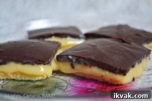 Butterscotch Slice. Layers of crisp shortbread, gooey #caramel and rich chocolate. Click the link for the #recipe