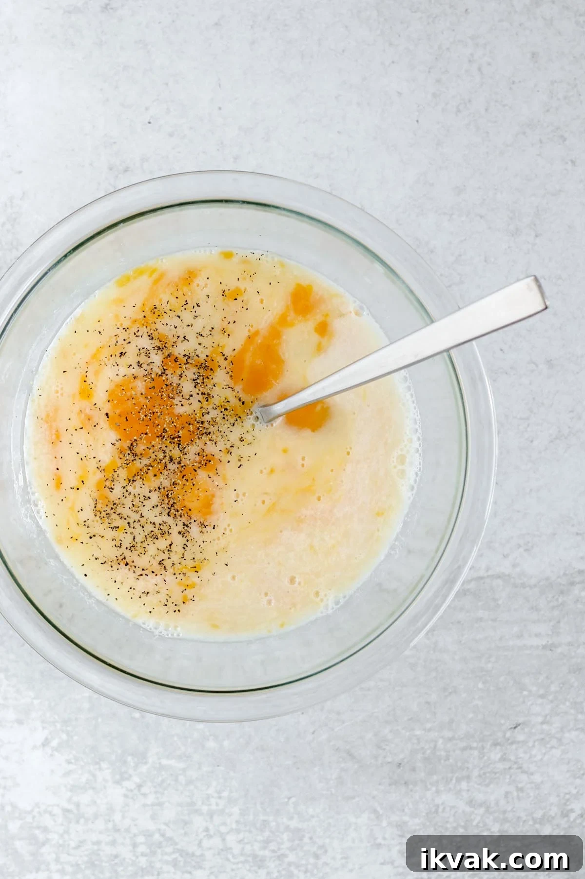 Dairy-Free Vegetable Frittata Gluten-Free Breakfast Recipe 5 Eggs whisked with dairy-free milk in a bowl.