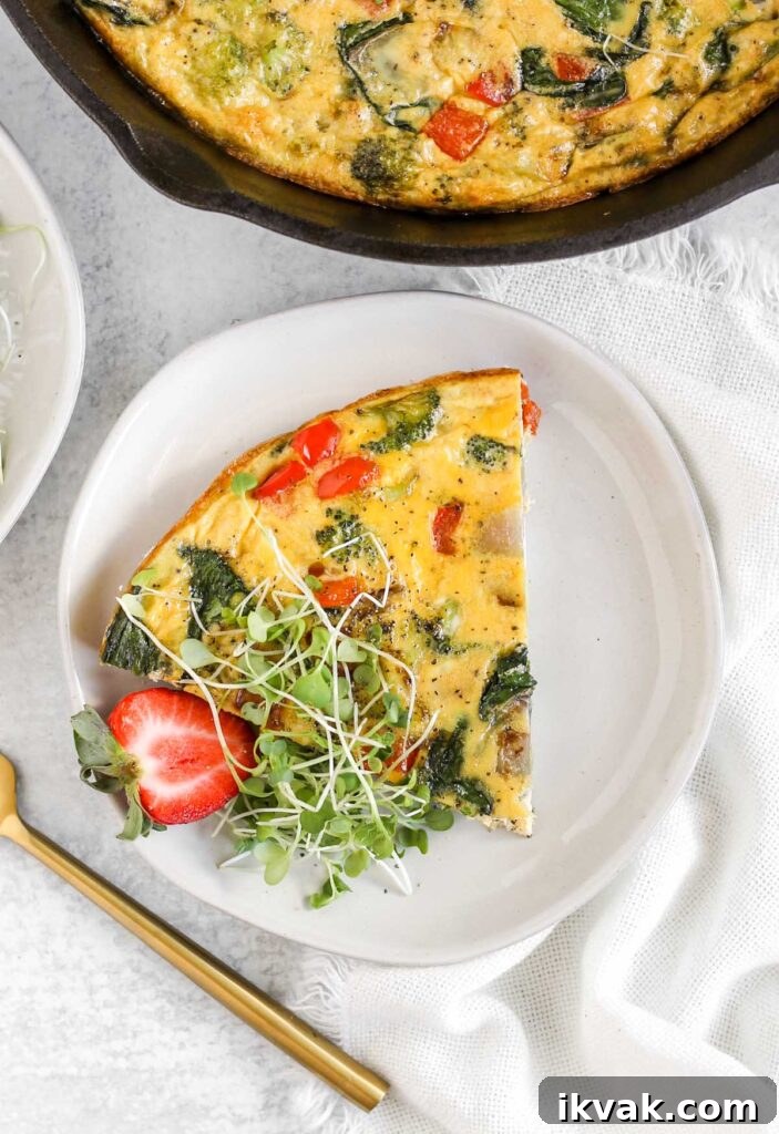 Dairy-Free Vegetable Frittata Gluten-Free Breakfast Recipe 8 A piece of vegetable frittata on a small white plate.