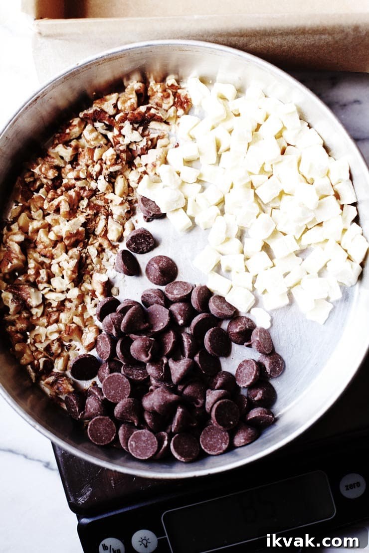 Chocolate Chips, White Chocolate, and walnuts in pan on scale