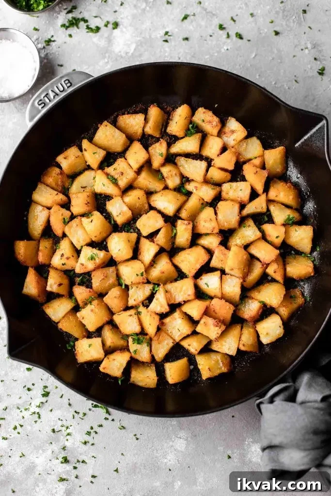 Crispy Skillet Breakfast Potatoes with Garlic and Herbs 3 breakfast potatoes in cast iron skillet (3)
