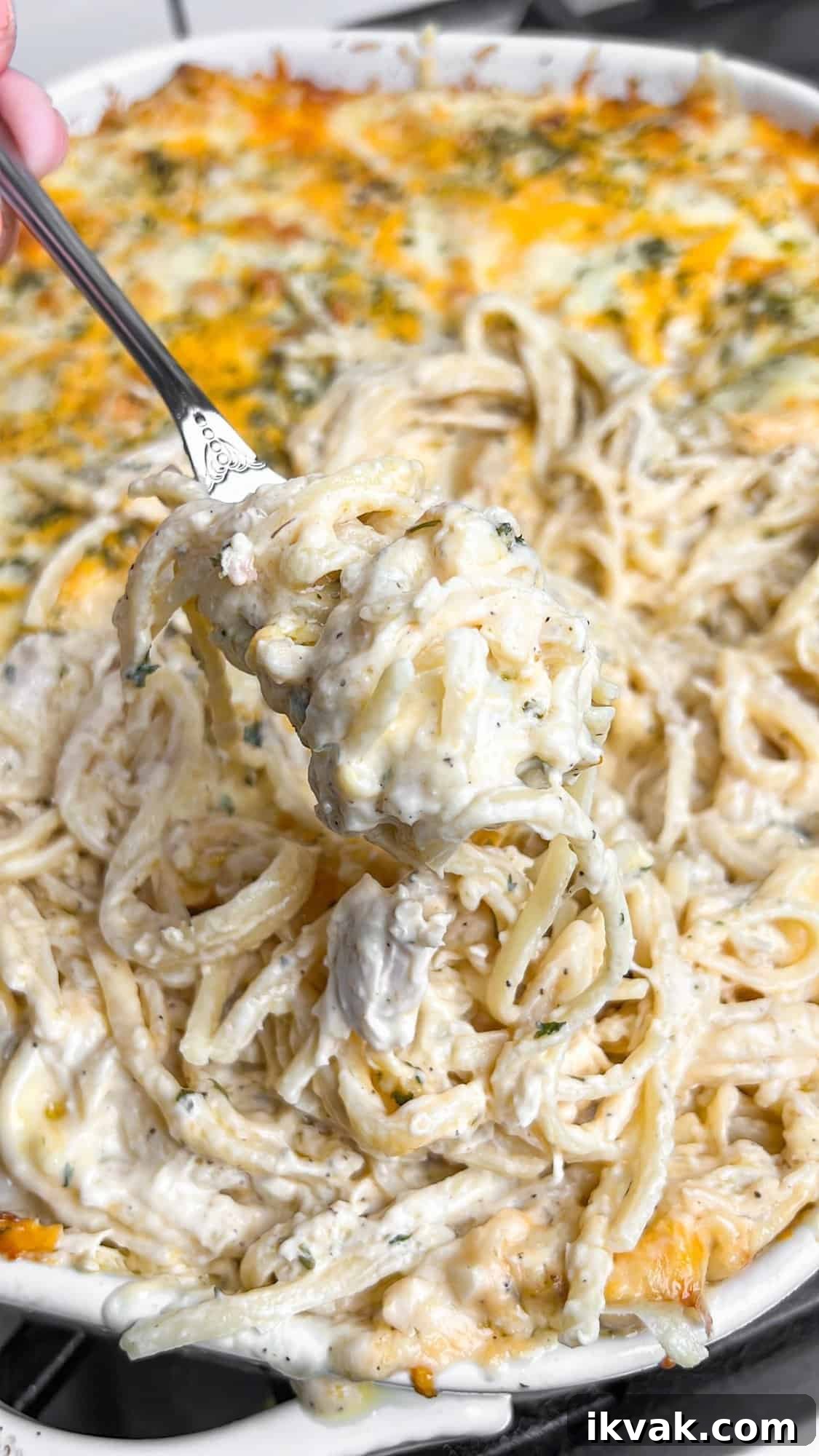 Lusciously creamy, cheesy, and garlicky, this easy chicken tetrazzini can be whipped up in under an hour for an easy weeknight dinner. A forkful of chicken tetrazzini
