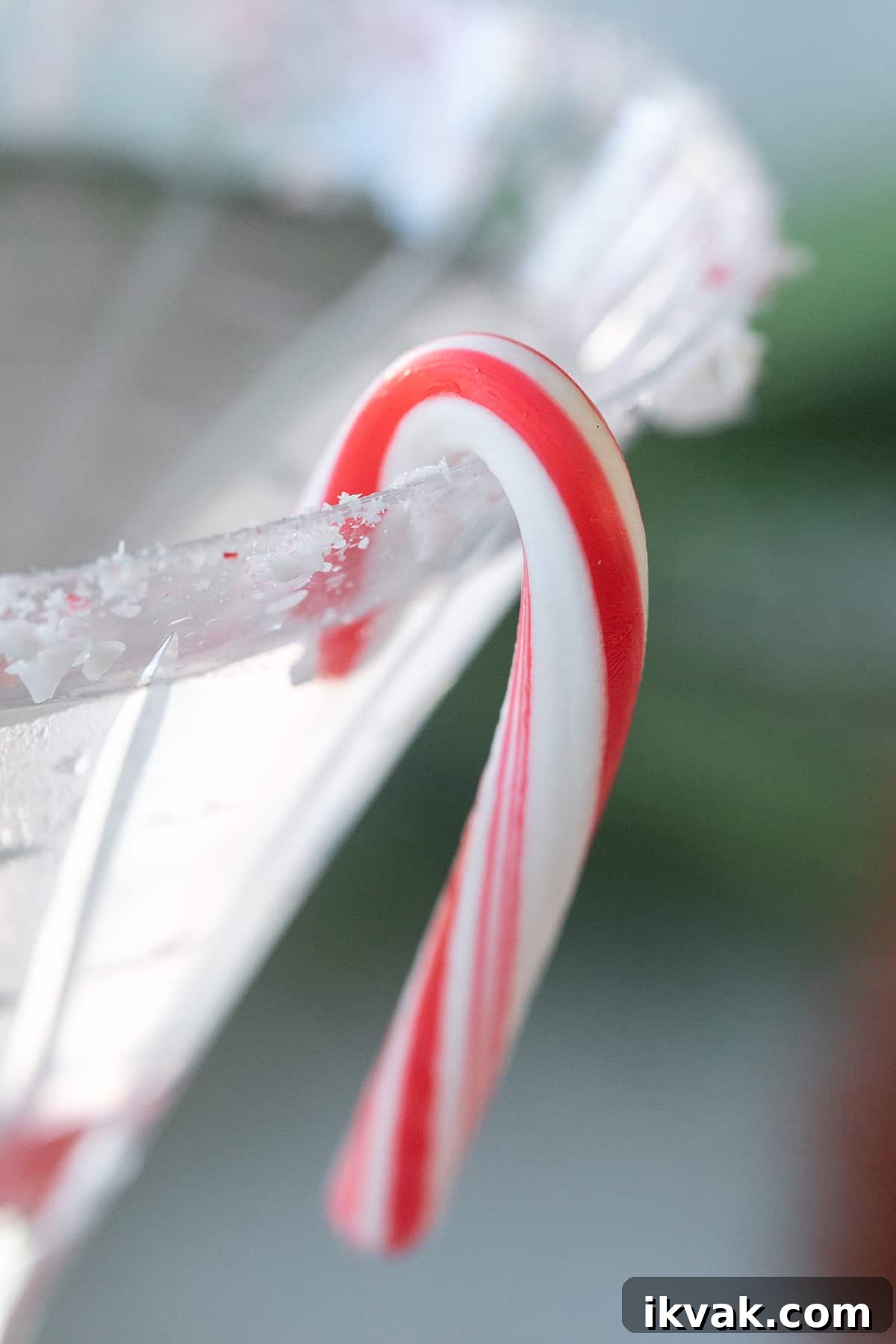 Candy cane on a martini glass - chocolate peppermint martini