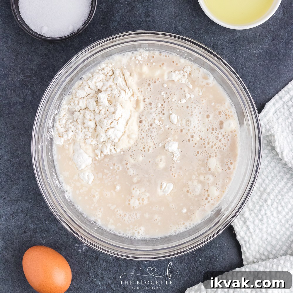 Combine yeast mixture with flour and salt