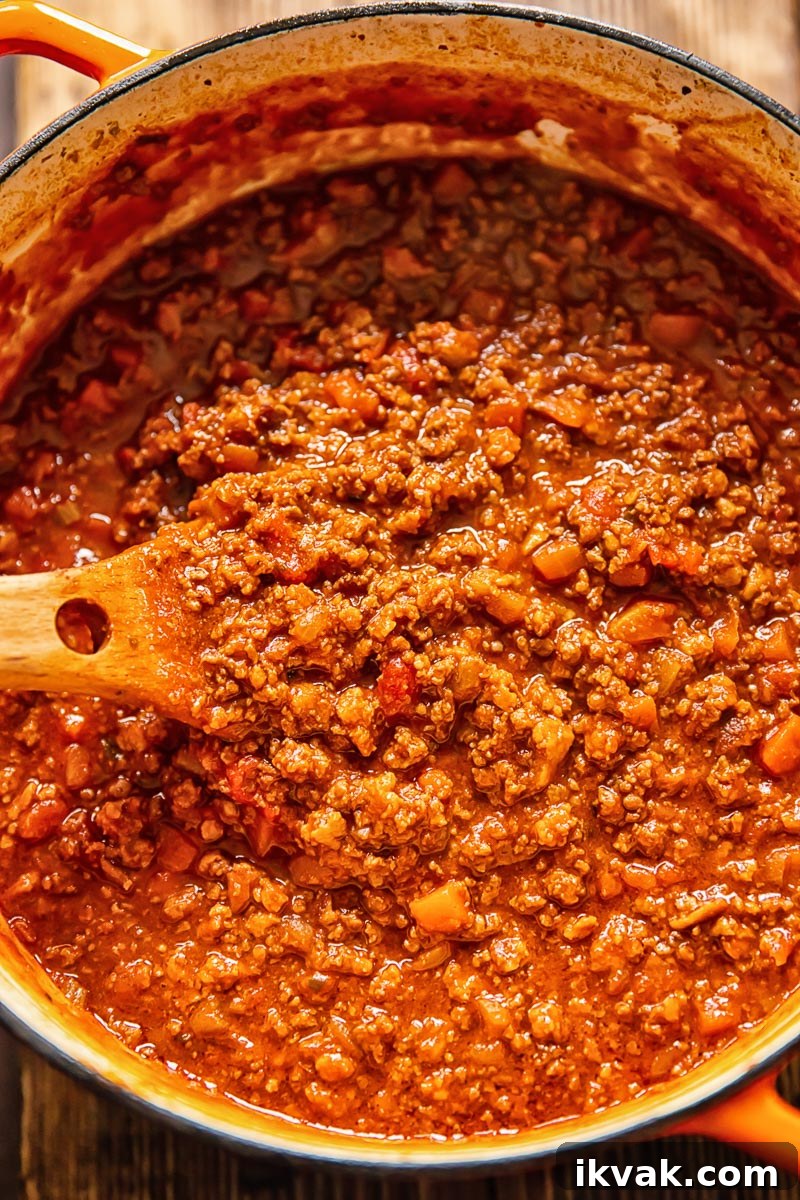 top down view of meat ragu in a pot