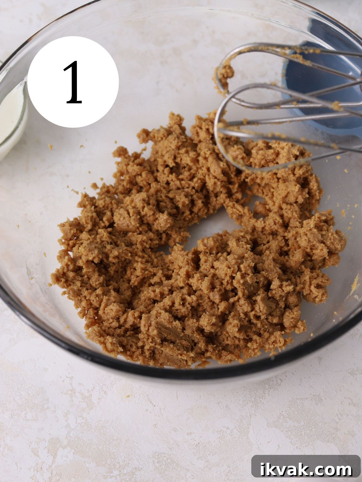 Irresistible Peanut Butter Donuts Recipe — Soft, Gooey, Homemade 4 Sugars and peanut butter beat together in a glass bowl with an electric mixer.