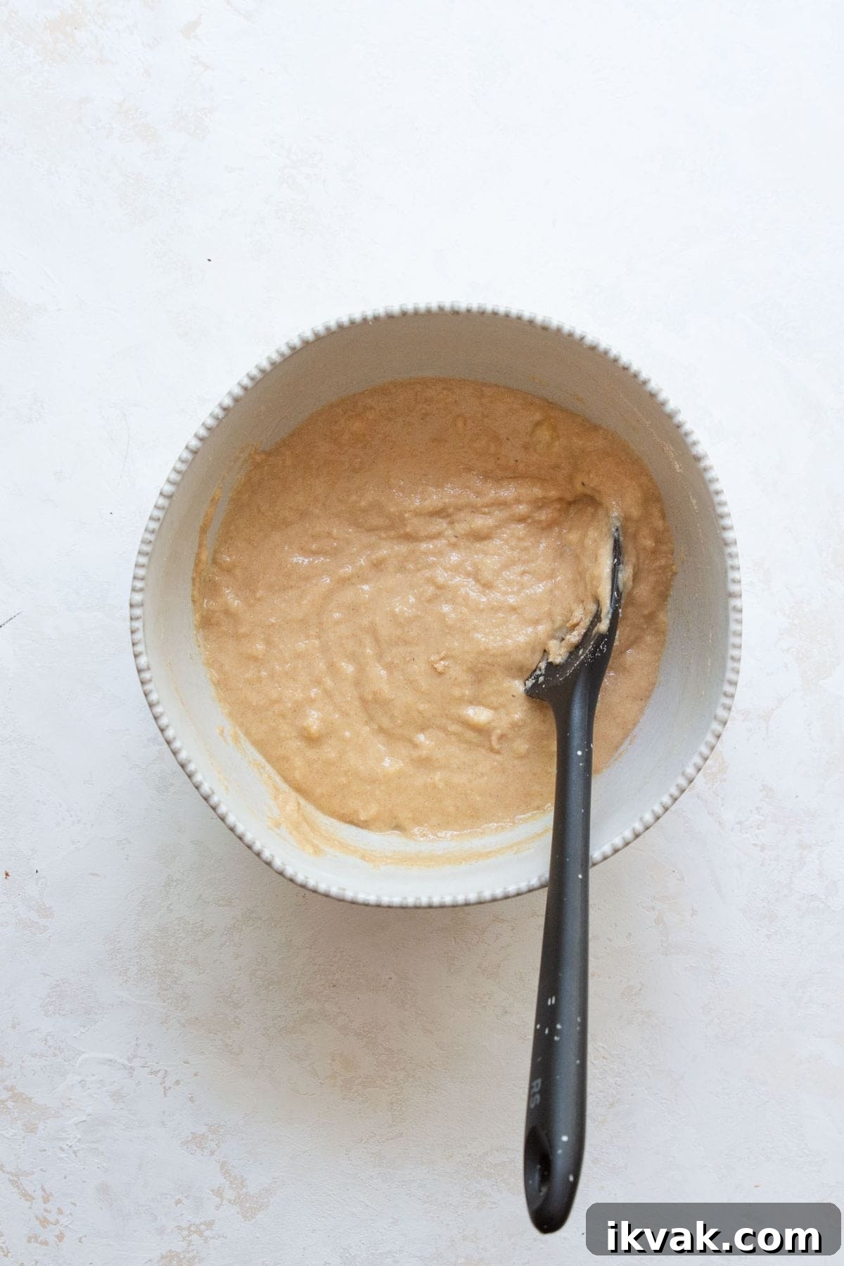 High-Protein Banana Muffins for Breakfast and Snacks 6 Banana protein muffin batter combined in a bowl, smooth and ready to fold in chocolate chips.