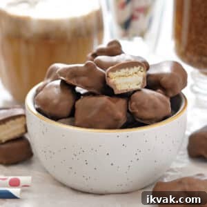 Homemade Root Beer Float Pieces in a white bowl, with one cut open to show the inside.