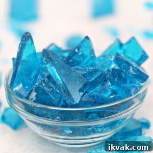 Blue rock candy in a glass bowl.