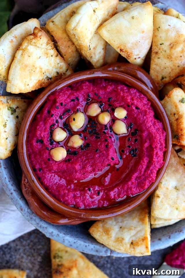 Beet Hummus Surrounded by Pita Chips