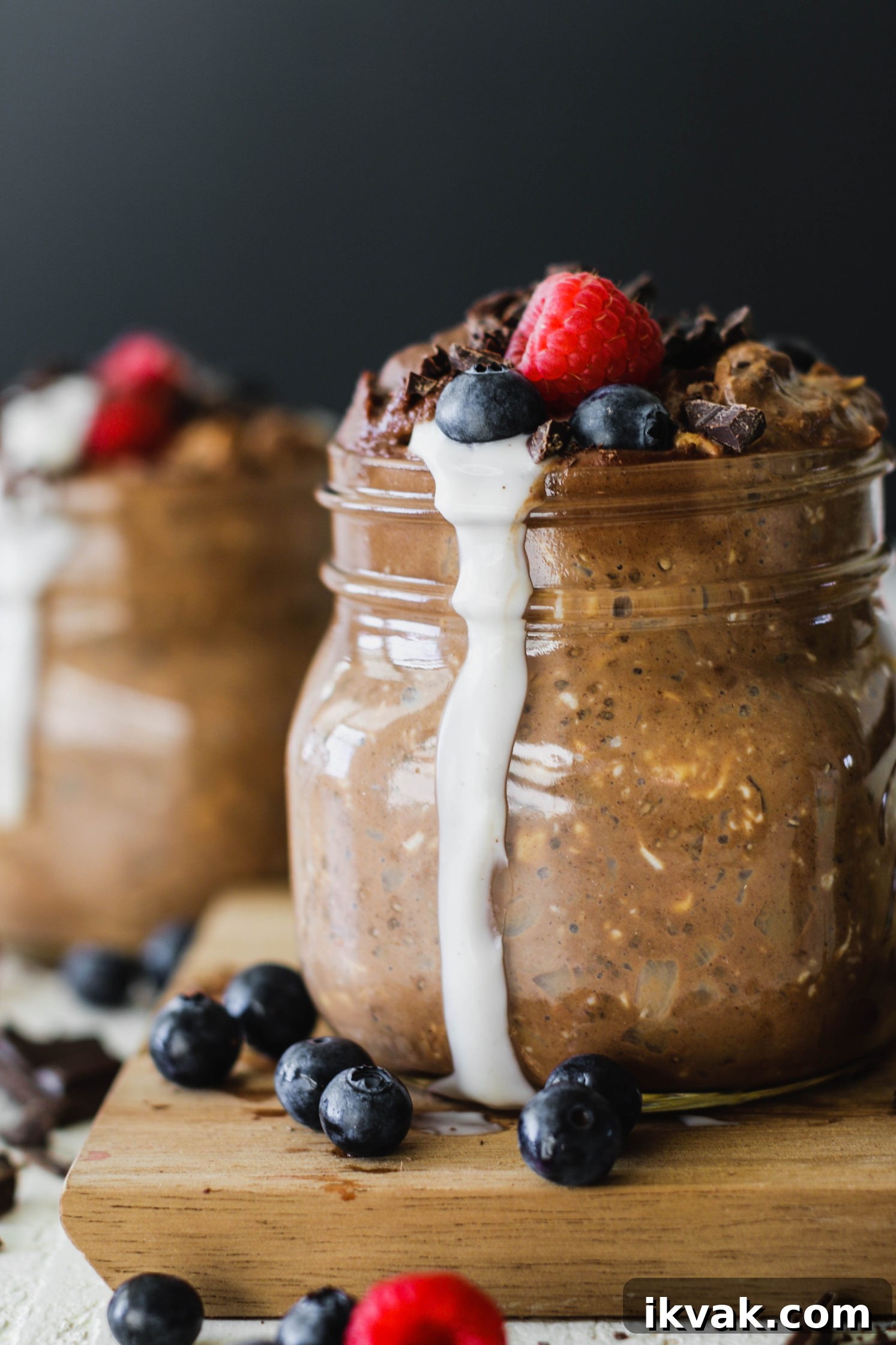 Hot Chocolate Overnight Oats Recipe for Chocolate Breakfast 7 Hot Chocolate Overnight Oats served in mason jars with Chocolate Cashew Cream by Flora & Vino