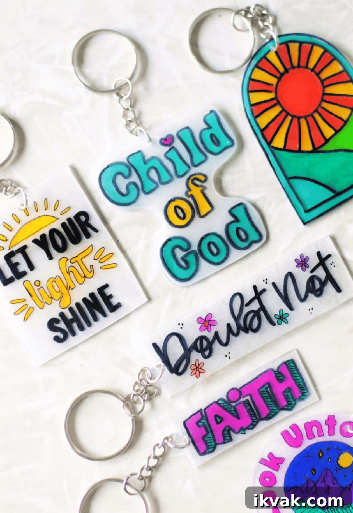 Variety of colored shrinky dink key chains.