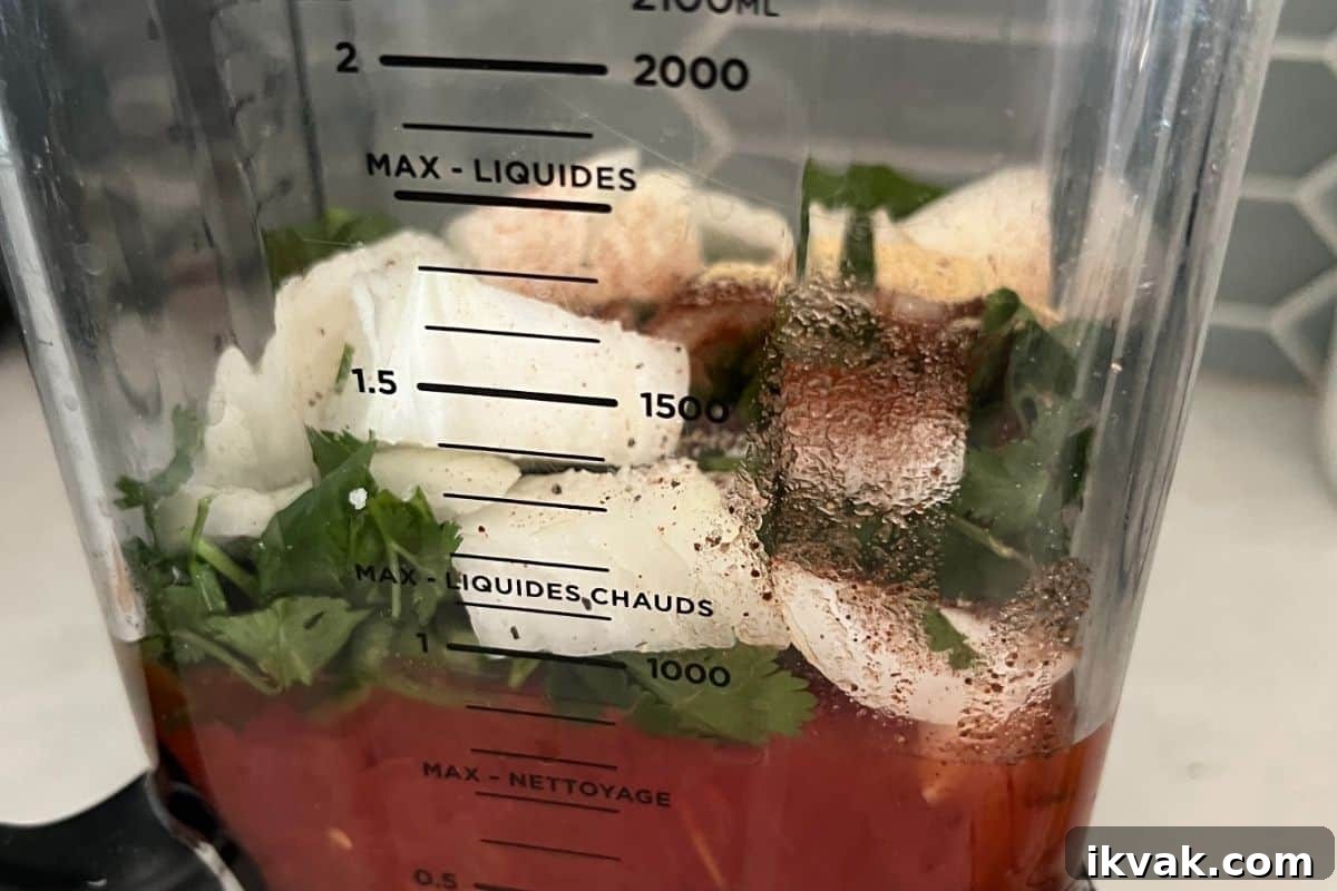 Low-Sodium Salsa Recipe: Fresh, Flavorful & Low-Salt 3 Ingredients for salsa combined in a blender.