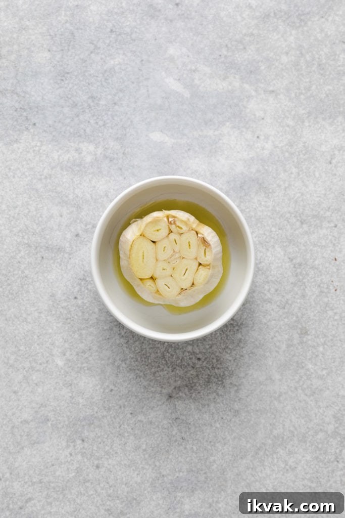Garlic and olive oil in a bowl.