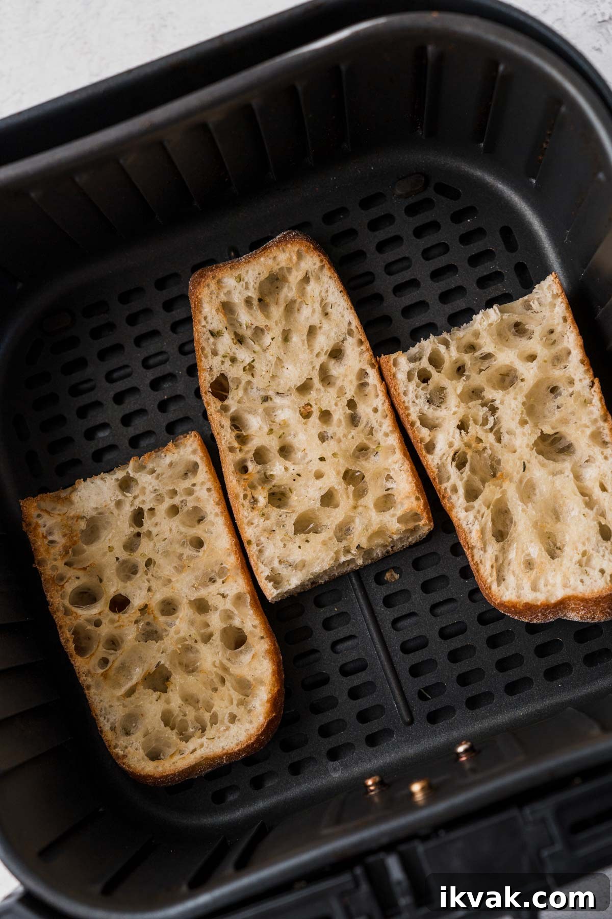 toasting the french bread in the air fryer.
